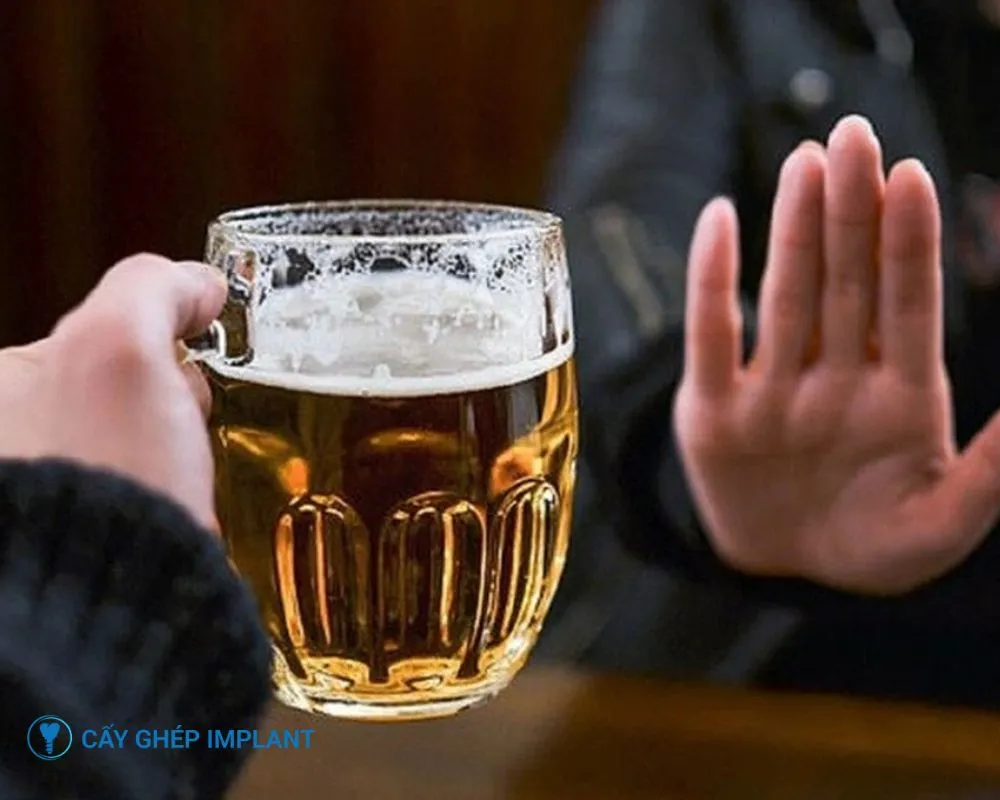 trồng răng implant có uống bia được không